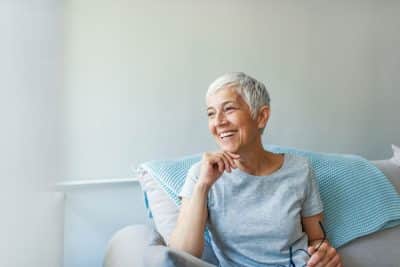 senior woman smiling with new dentures